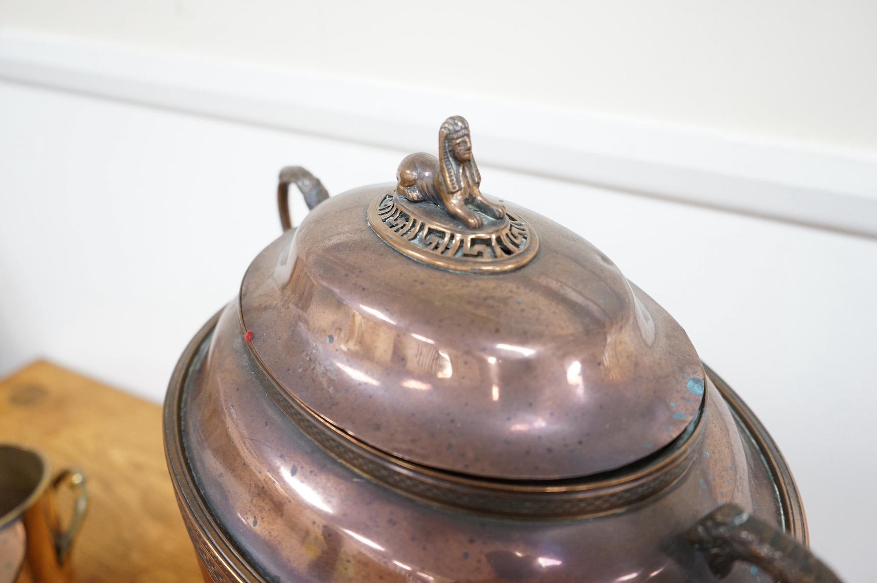 A copper samovar and bottle stand. Condition - fair to good